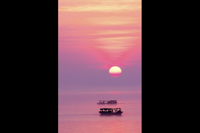 Ferry of Foggy Sunrise